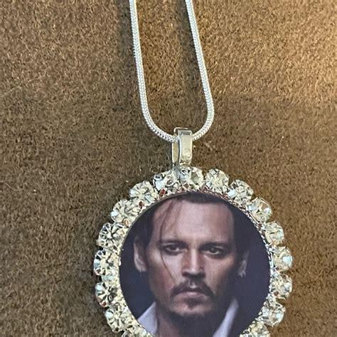 johnny depp black tie necklace.